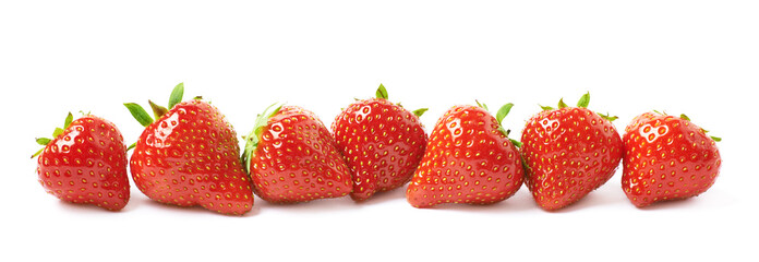 Line of red strawberries isolated