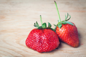 Fresh strawberry were placed on wood background