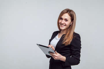 Smiling Businesswoman Holding Digital Tablet. Isolated On White