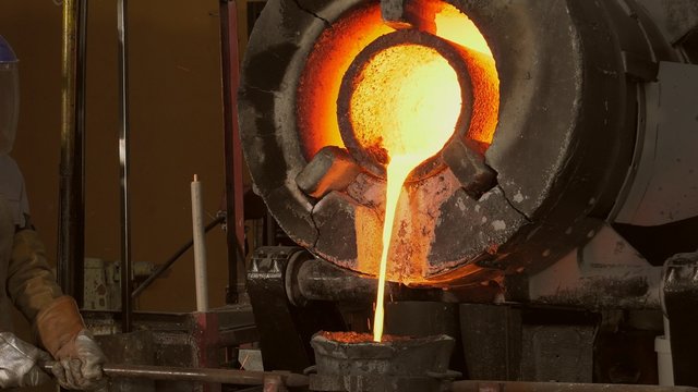 Lost wax bronze casting in a foundry