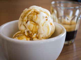Affogato coffee, espresso shot with vanilla ice cream, backgroun
