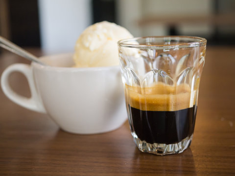 Affogato coffee, espresso shot with vanilla ice cream, backgroun