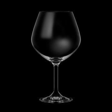 empty brandy glass on black background