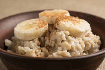 Oatmeal with banana sprinkled ground cinnamon
