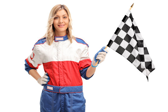 Female car racer waving a checkered race flag