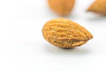 Almonds on a white background - close up of almond 