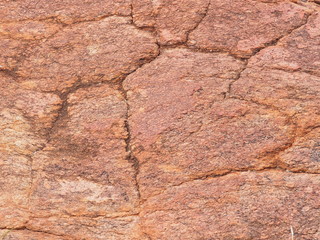 Background close-up of orange red dolomite rock near Alice Springs, red center, Australia June 2015
