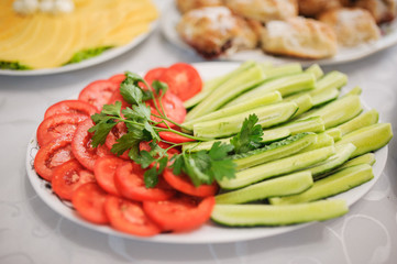 Tasty appetizer. tomatoes with cucumber
