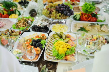 Cattering. Table full of food at a restaurant.