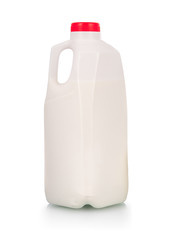 Milk in plastic bottle on white