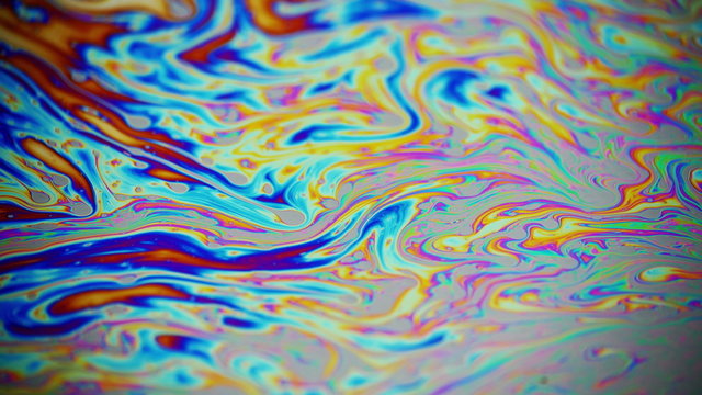 Colorful soap bubble surface macro close up.