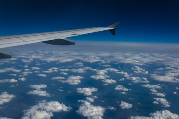 Fototapeta premium Flug über den Wolken