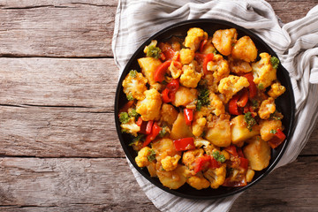 Gobi Aloo with cauliflower and vegetables horizontal top view