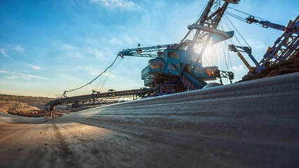 Long conveyor belt transporting ore