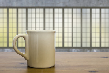 mug on old wooden table