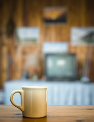 mug on old wooden table
