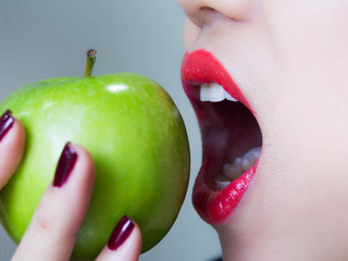 red lips with green apple