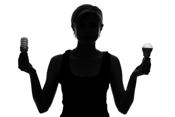 silhouette of a woman with lamps