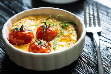 Omelette with cherry tomatoes and pancetta