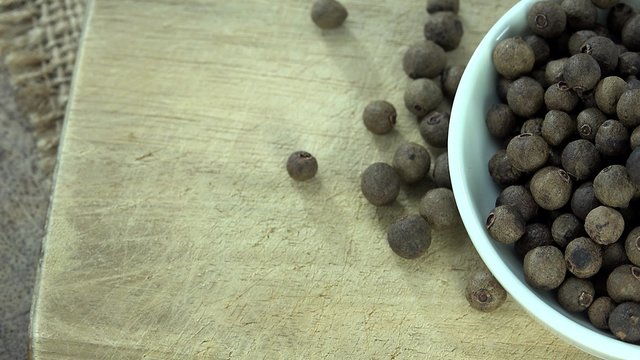 Portion of rotating Allspice (seamless loopable 4K footage)