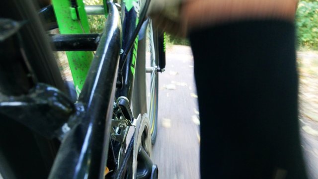 biking, cycling, cyclist rotates pedaling 