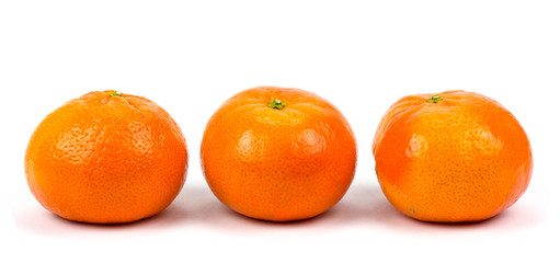 Three tangerine on a white background