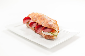 Ciabatta with pastrami, cheese, zucchini, tomato