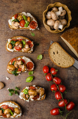 Toasted bruschetta with riccotta and pesto