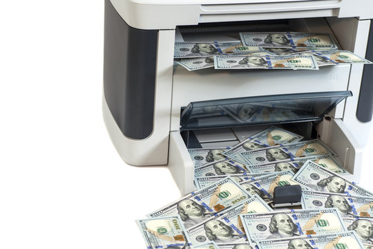 Printer printing fake dollar bills isolated on white background