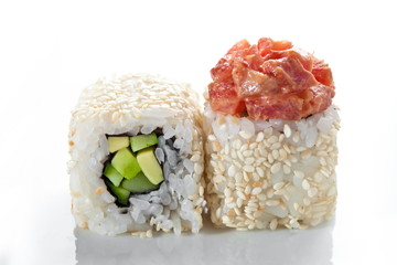 Close up shot of traditional fresh japanese sushi  rolls  on a white background 