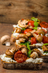Toasted bruschetta with riccotta and pesto