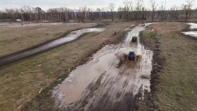 Aerial view of utv race. Mud track.