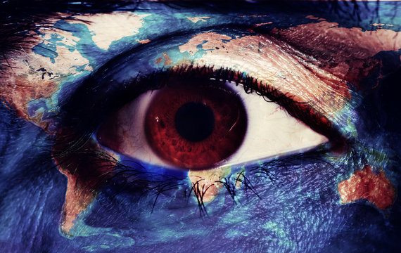 face patterned with a world map (furnished by NASA)