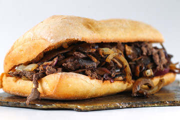 Tasty beef steak onion mushroom sandwich in a ciabatta 
