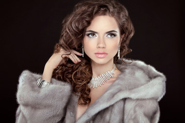 Makeup. Beautiful girl portrait. Brunette fashion woman in mink