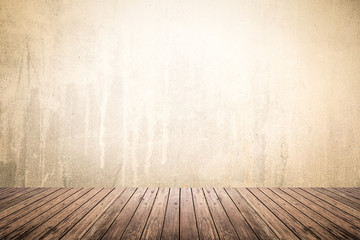 Empty room of grunge wall and wooden floor