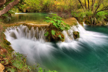 Beautiful long exposure image of a small water reservoir in Plitvice national park, an UNESCO world heritage site, in Croatia. HDR