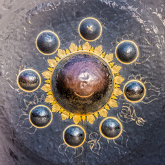 Texture and pattern of large old nipple gong at Buddhist temple. It is at Wat Nong Waeng in Khon Kaen province, Thailand.