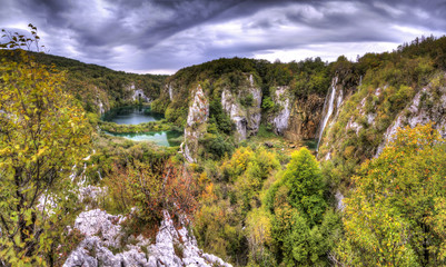 Dark clouds over a beautiful autumn view of Plitvice national park in Croatia, a UNESCO world heritage site