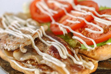 Tasty bacon lettuce tomatoes sandwich in a ciabatta 