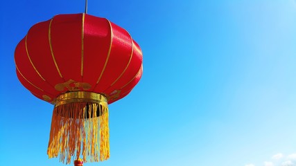 Red Chinese lantern on blue sky background