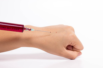 syringe sucking human blood
