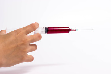 Syringe in hand