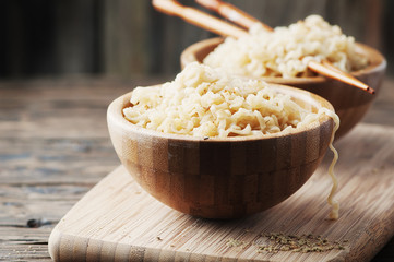 Asian fast food noodle on the wooden table