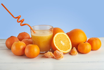 Orange juice with fruits. Close up.