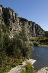 Fototapeta na wymiar Ardeche river near Vogüé village, Village of Vogüé, Rhone-Alpes, France