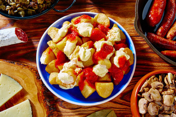 Tapas Patatas Bravas potatoe fries with tomato