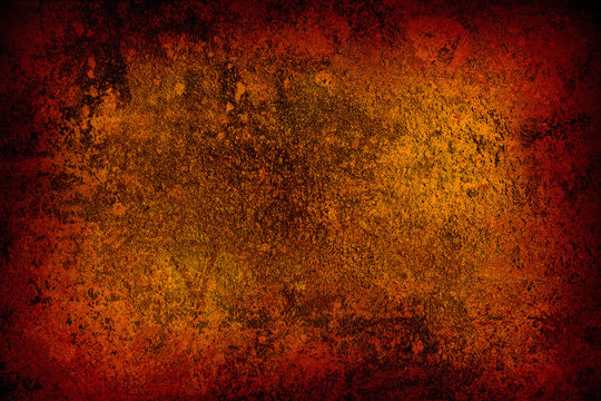 grunge abstract orange background with stains close up