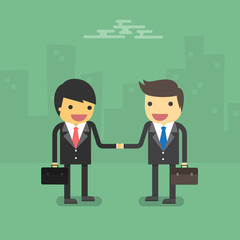 Businessman partnership handshake