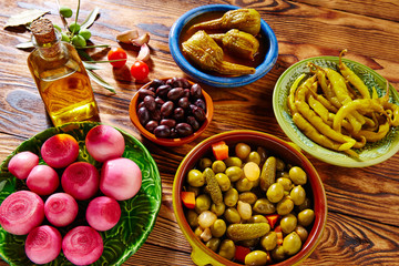 Tapas pickles mix olives chili onion eggplant
